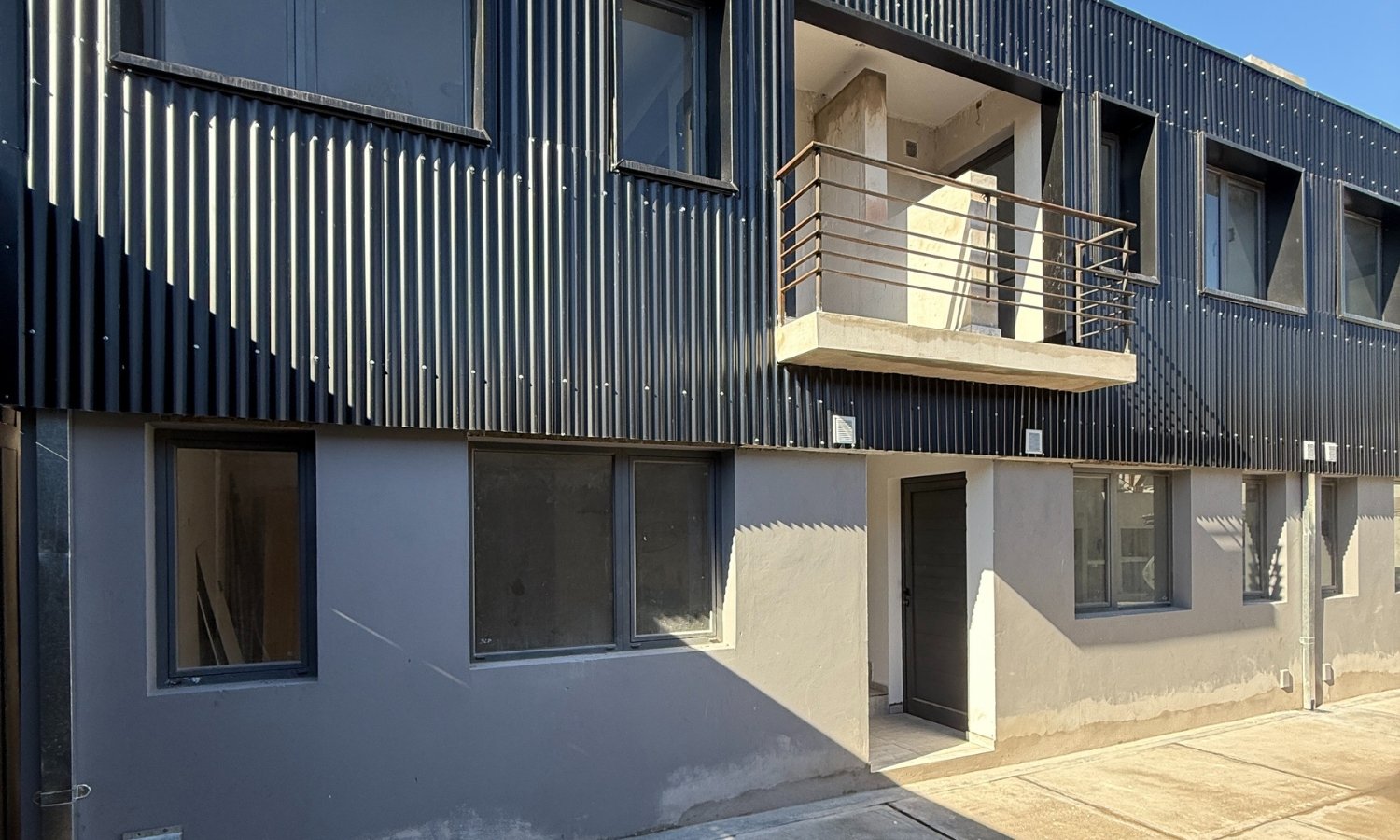 vista-general-living-cocina-departamento-balcarce